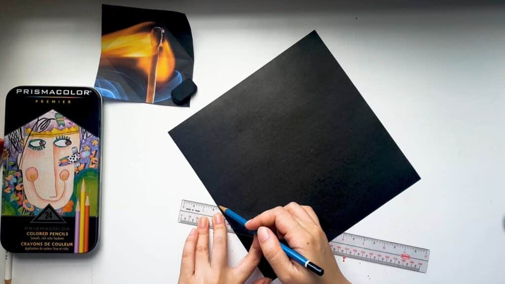 Preparing the black paper for flame drawing