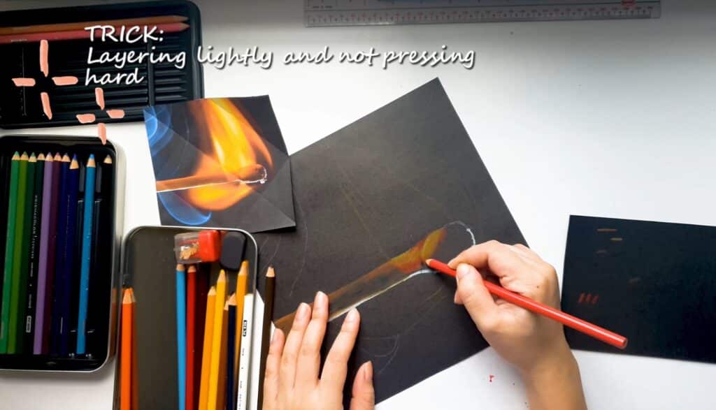 This image shows how to color flames with colored pencil on black paper.
