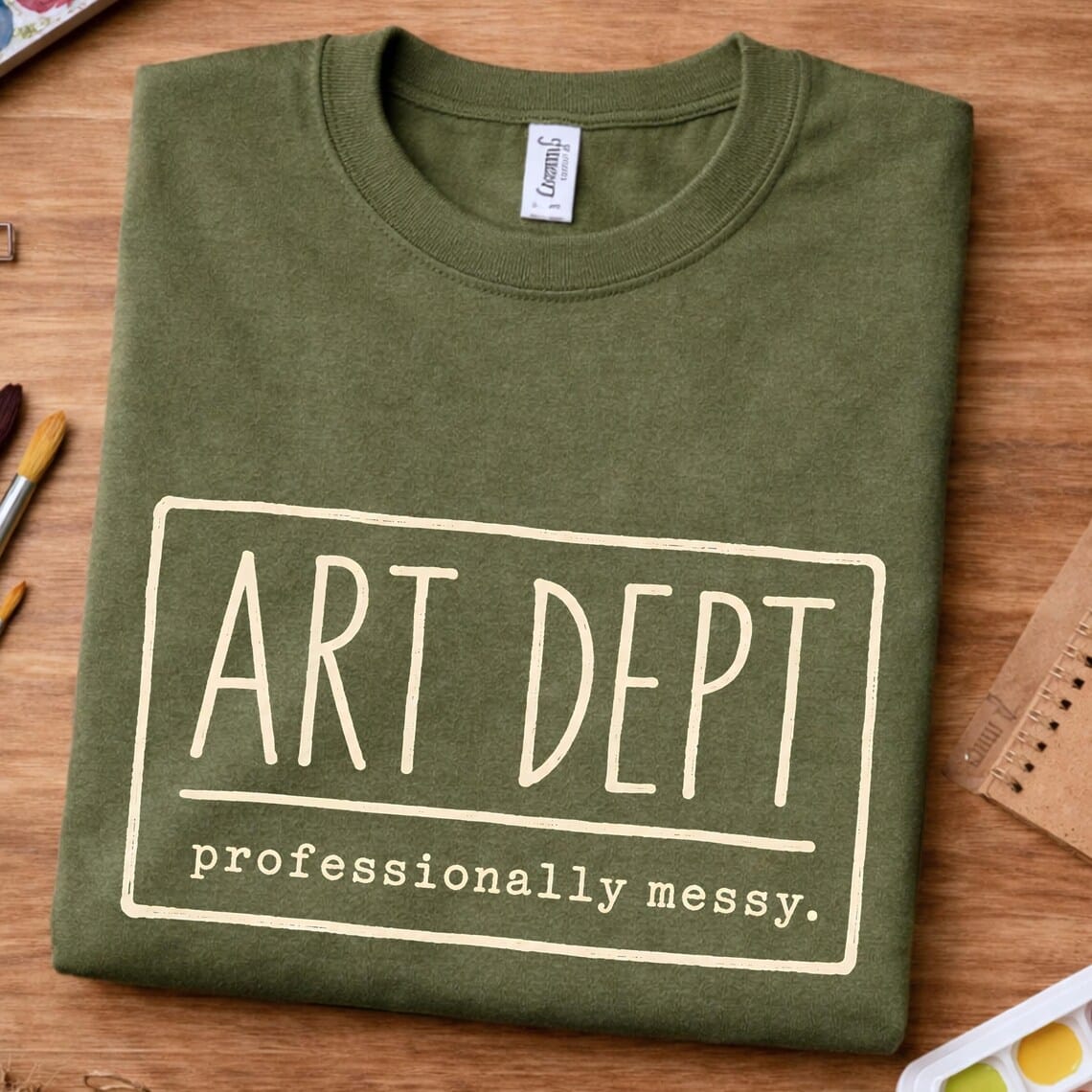Art room humor shirt featuring Art Dept Professionally Messy design