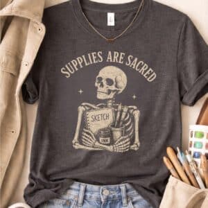 Art supplies shirt featuring Supplies Are Sacred vintage design