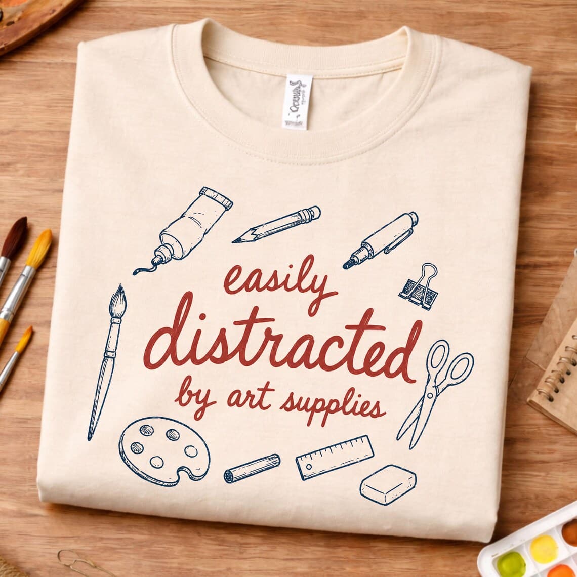 Art supply lover shirt featuring Easily Distracted by Art Supplies design