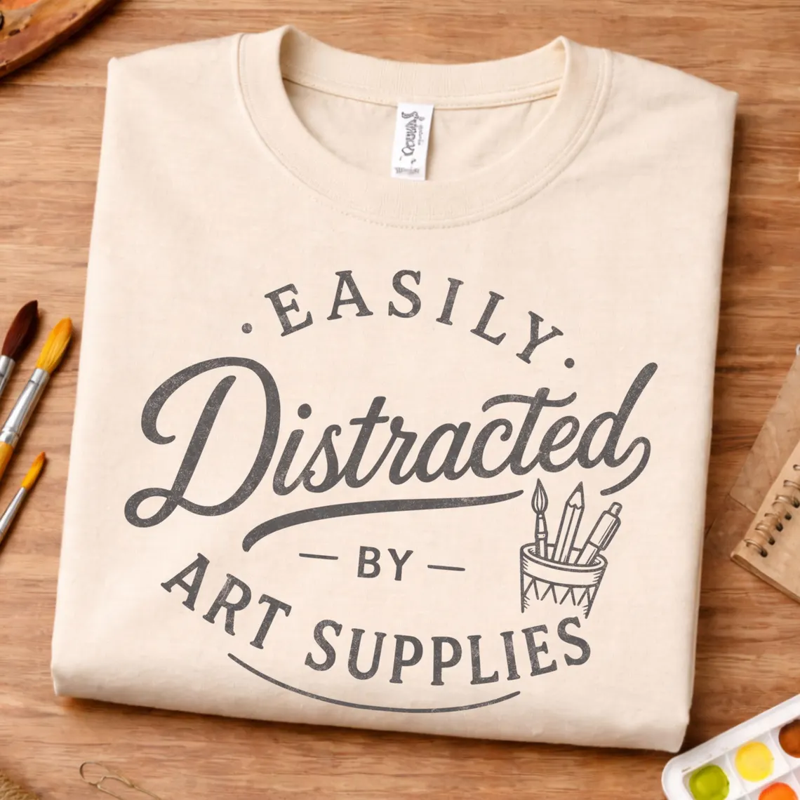 Artist supplies shirt featuring Easily Distracted by Art Supplies typography
