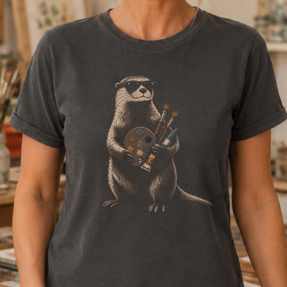 Otter artist shirt featuring otter with art supplies