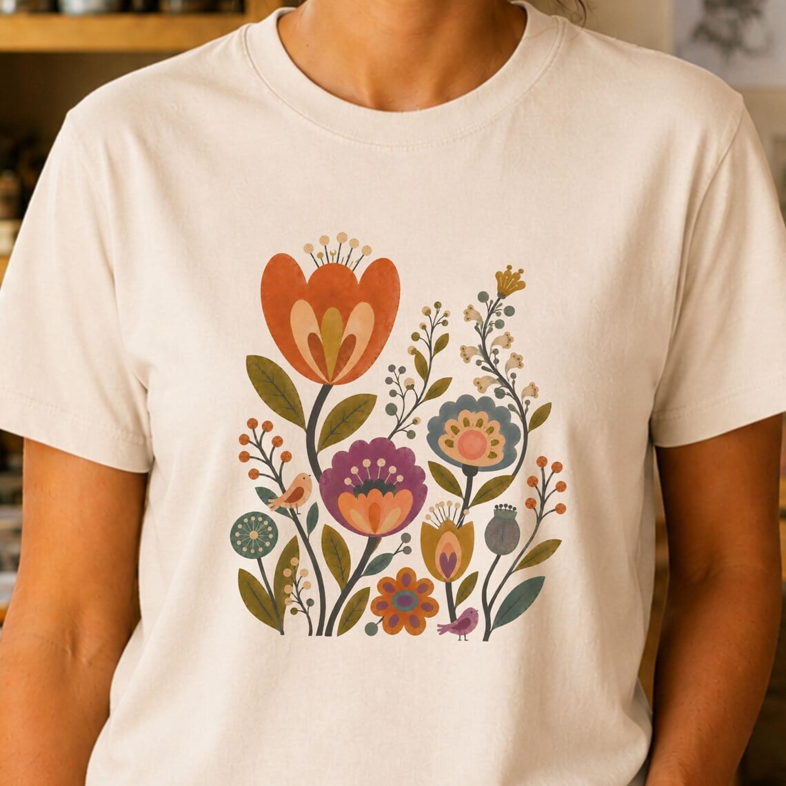 Scandinavian folk art shirt featuring vintage botanical floral illustration
