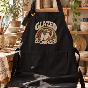 Funny pottery apron featuring Glazed and Confused